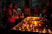 Worship and puja offerings inside the Swamimalai temple.